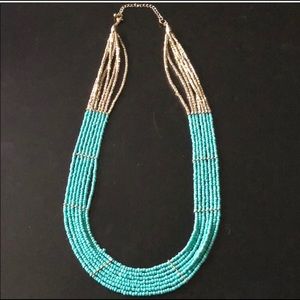 Turquoise and gold statement necklace